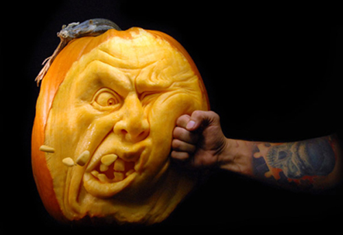 Pumpkin carving #2 is being punched.